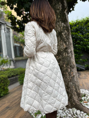 Piumino trapuntato stile couture